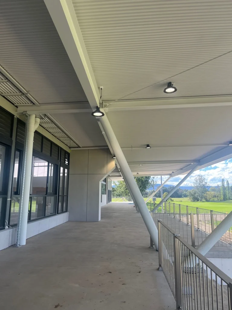 Covered walkway and ceiling lights at Bega Sports Complex