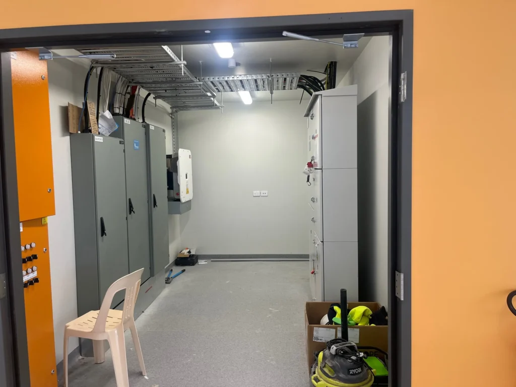 Open electrical cabinet and wiring at Bega Sports Complex
