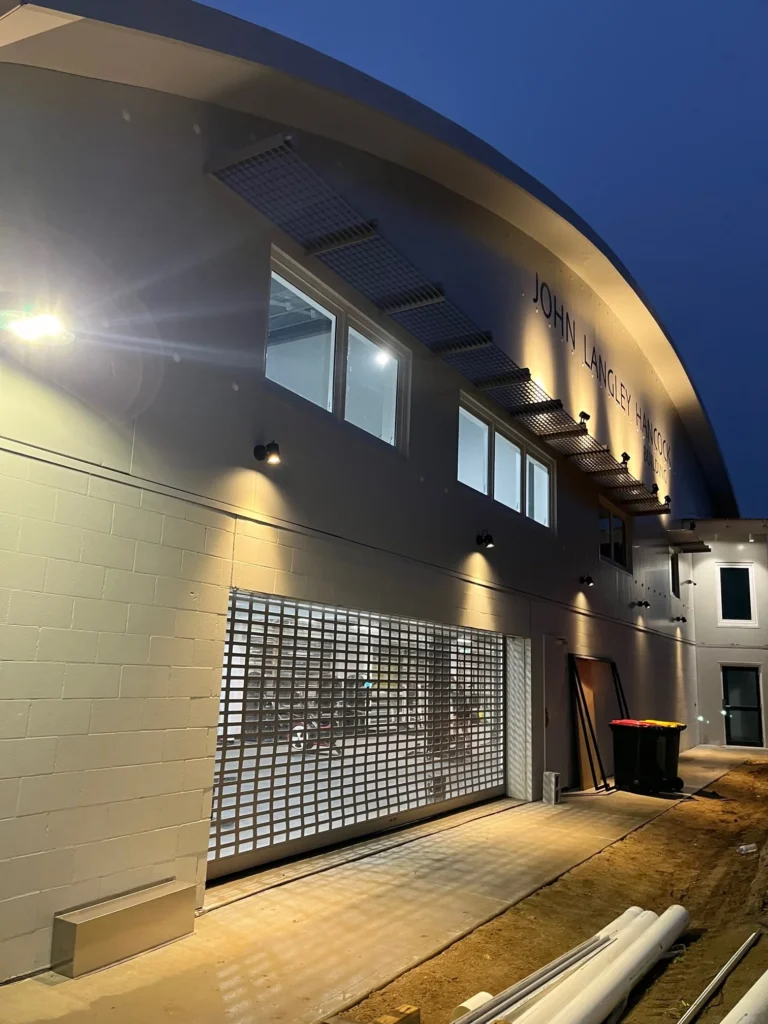 Illuminated exterior walkway at the Jindabyne training facility