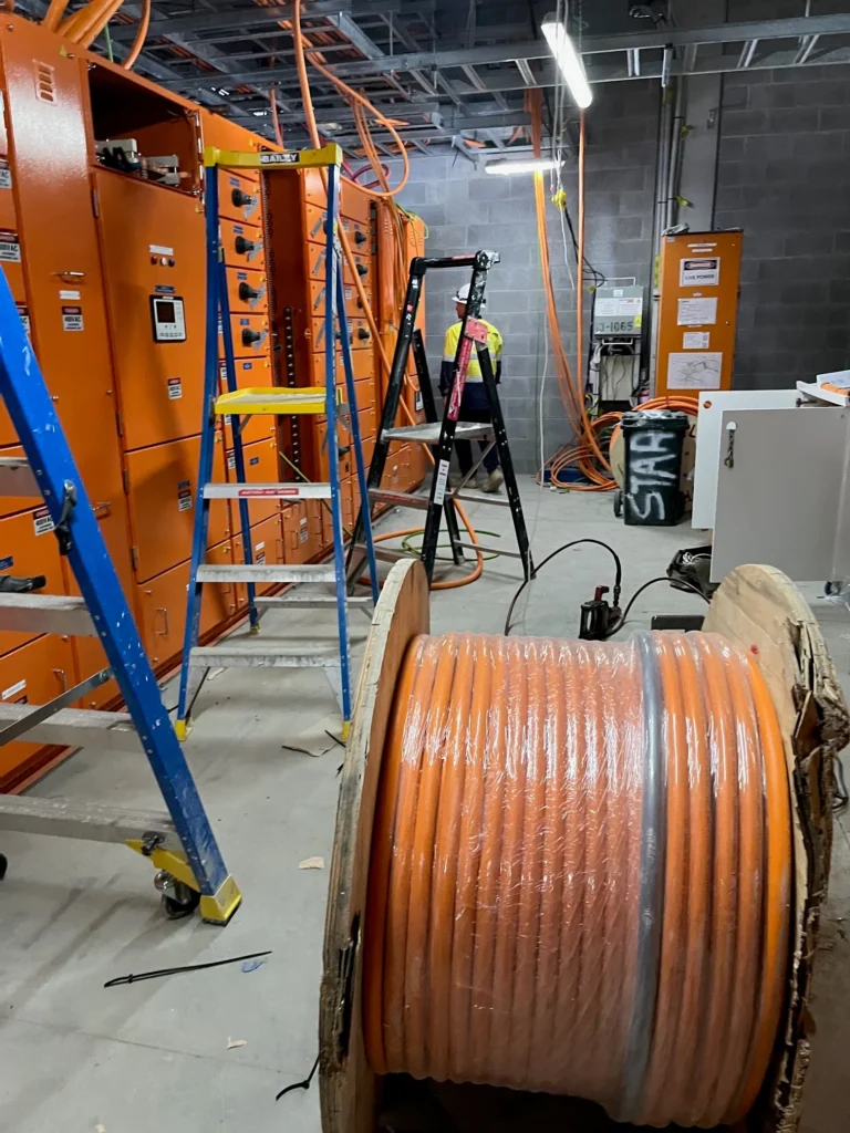 Switchboards, ladders and cable drum at Eurobodalla District Hospital
