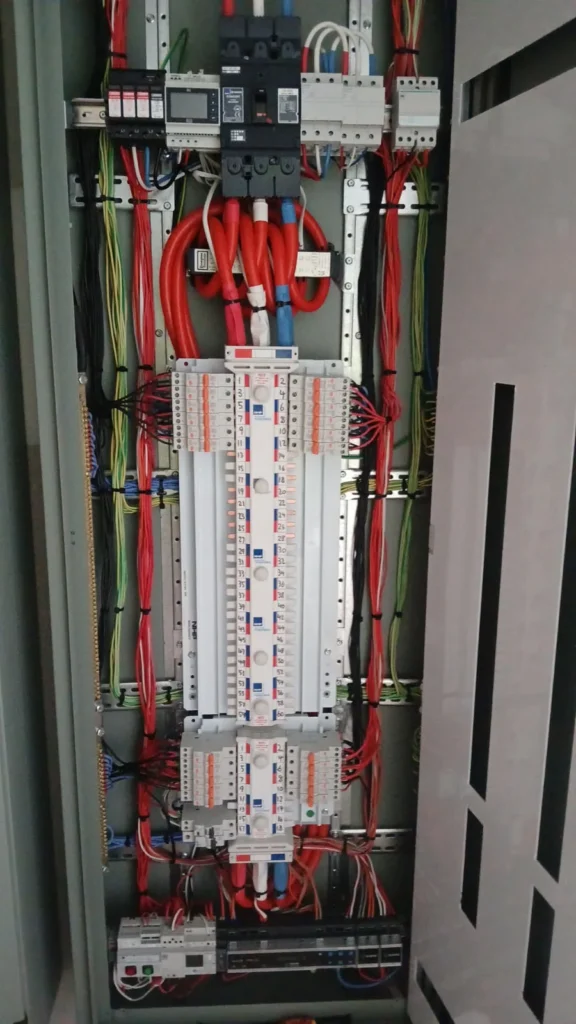 Close view of circuit breakers and cabling in a Bega Sports Complex switchboard