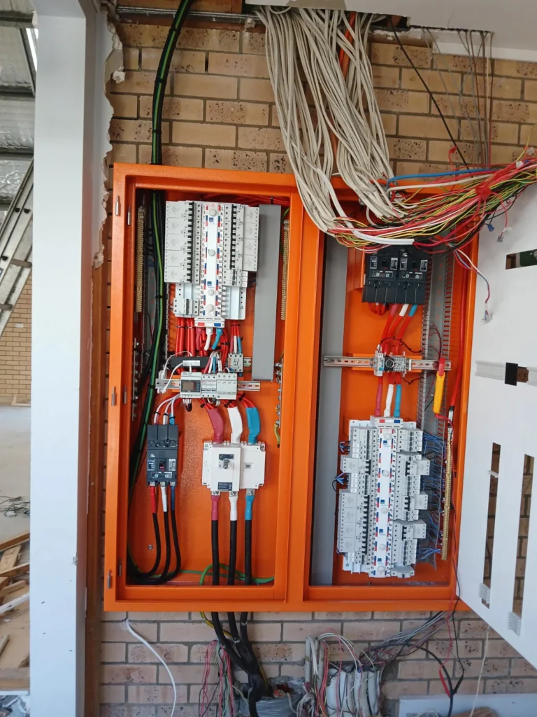 Open switchboard with installed cabling at Carroll College